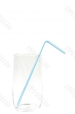 Empty glass with a straw isolated on white