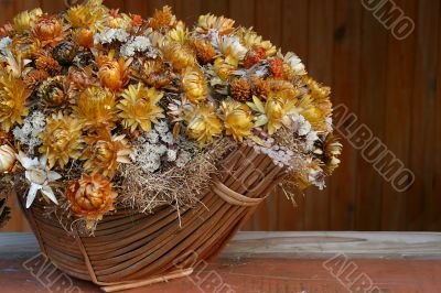 Bunch of dry flowers in basket