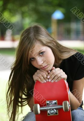 The girl with a skateboard