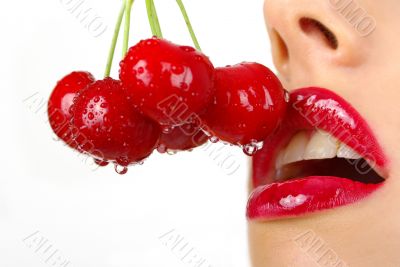   picture of cherry and lips over white