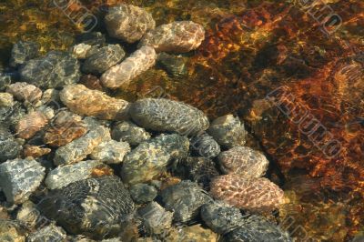 Low tide ripples, granite pebbles
