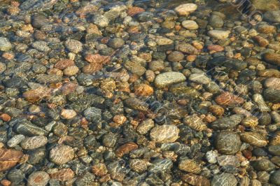 Low tide ripples, granite pebbles