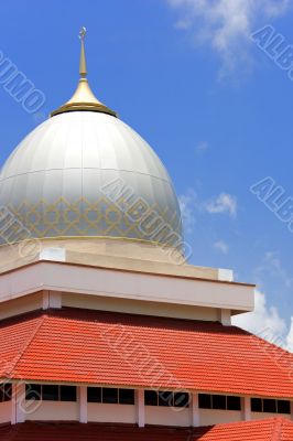 Dome and Red Roof of a Mosque