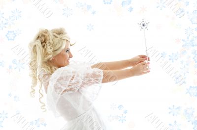 fairy with magic wand and snowflakes