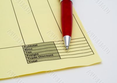 Blank invoice with pen