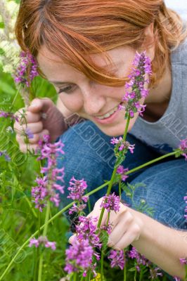 Girl looking on bumblebee