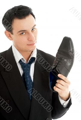 salesman with black leather boot