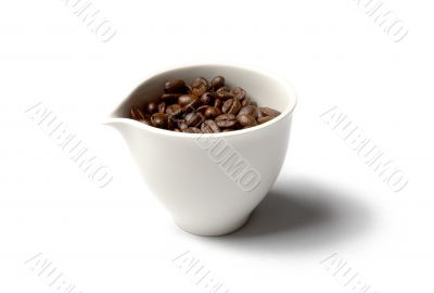 cup full of colombian coffee beans