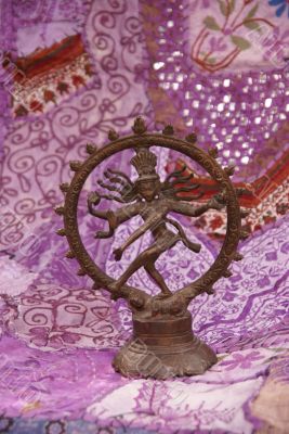 Bronze Shiva on purple