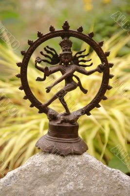 Bronze Shiva in garden