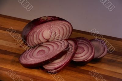 Sliced red onion displayed
