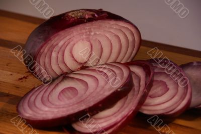 Sliced red onion displayed
