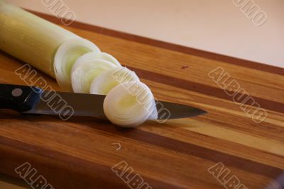 Slicing leeks with a knife