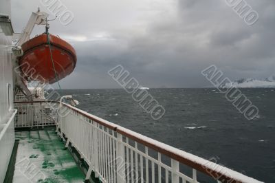 Life boat and cruise ship deck