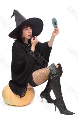 Pretty witch making up