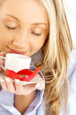 blond with cup of coffee and chocolate