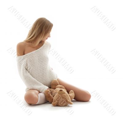 lovely blond in white sweater with teddy bear