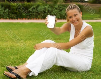 woman sit on a grass