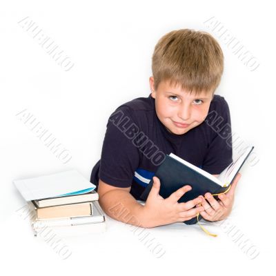 young boy studying