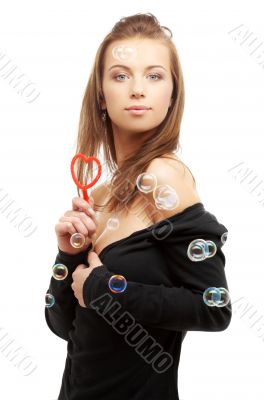 lovely girl with heart-shaped blower lovely girl with heart-shaped blower