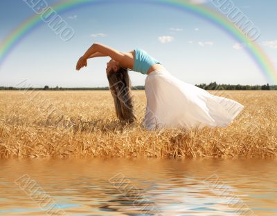 stretching woman with rainbow and water