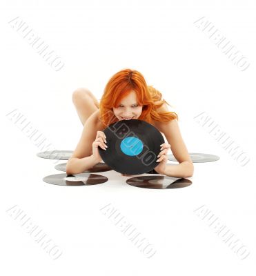 playful redhead with vinyl records