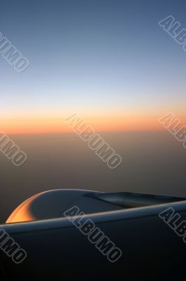 Sunrise over aeroplane engine II