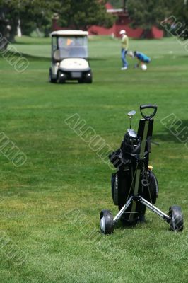 Hand cart with golf clubs