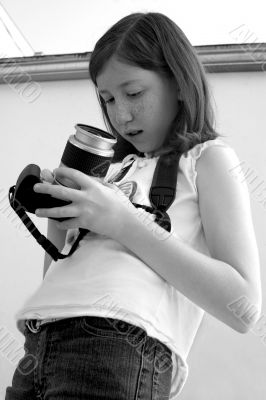 Girl with SLR photo camera