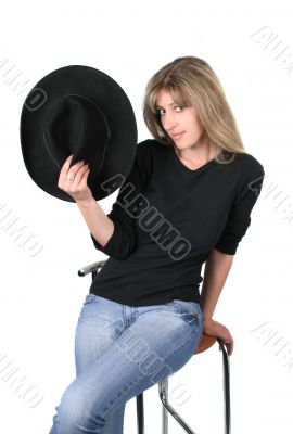 Beauty blonde girl with black hat