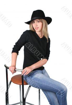 Beauty blonde girl with black hat