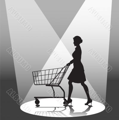 Woman Shopper &amp; Shopping Cart in Spotlight