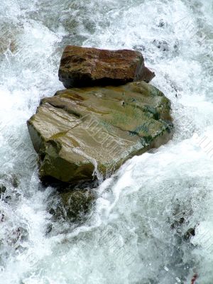 Stone in the mountain river