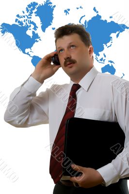 Young the man talking by a mobile phone