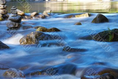 little river with many stones