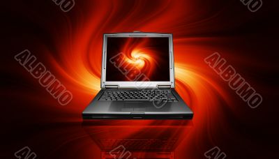 Laptop on fiery background
