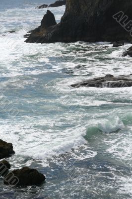 Incoming surf on rocky beach