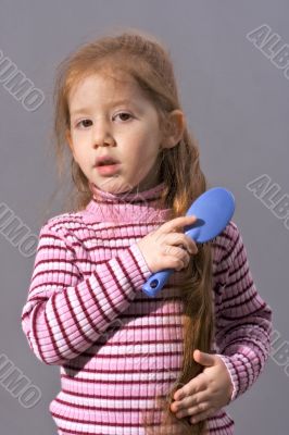 Girl with comb