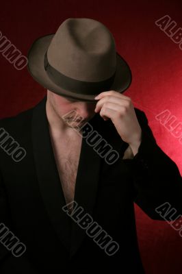 strainger - man in grey hat