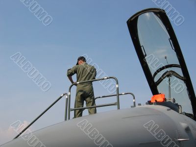 Aircraft - Pilot getting ready at front of cockpit Aircraft - Pilot getting ready at front of cockpit