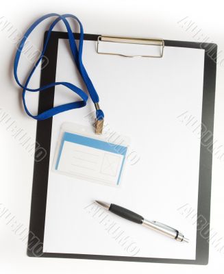 paper with badge and pen