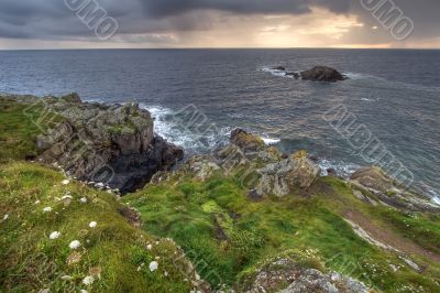 green coastline at dusk