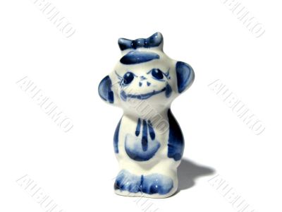Little funny ceramic monkey isolated
