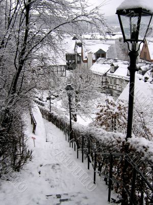 White-snowy stairs in a old little german town