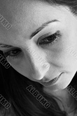 Black and white woman in thoughts