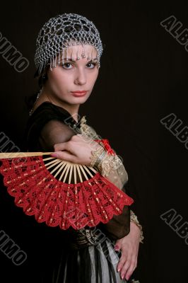 Decadanse with a red fan