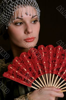 Decadanse with a red fan