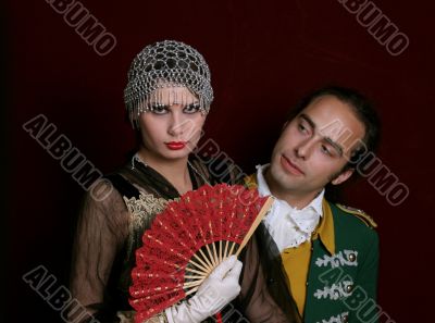 Men and girl in mascarade dresses