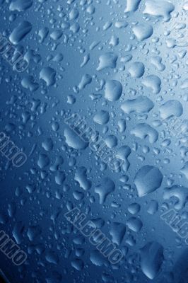 Water Drops on Metalic blue background Water Drops on Metalic blue background