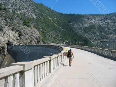 Hiker on Hetch Hetchy Dam Hiker on Hetch Hetchy Dam